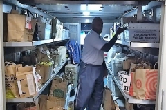 Porter Square's Marvis Hodges packing a truck