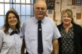 Wellesley Sq. Retiree Kevin Leach is congratulated by Union Steward Toni Alexander & Vice President Bernadette Romans